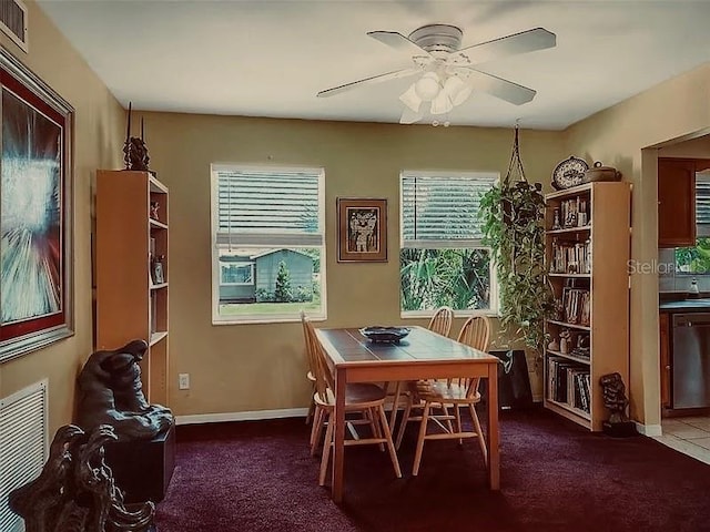 dining area with visible vents, baseboards, carpet, and ceiling fan