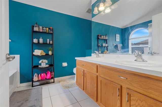 4605 Lisette Cir, Brooksville, FL 34604 - full bathroom with a chandelier, tile patterned flooring, double vanity, toilet, and a tub to relax in