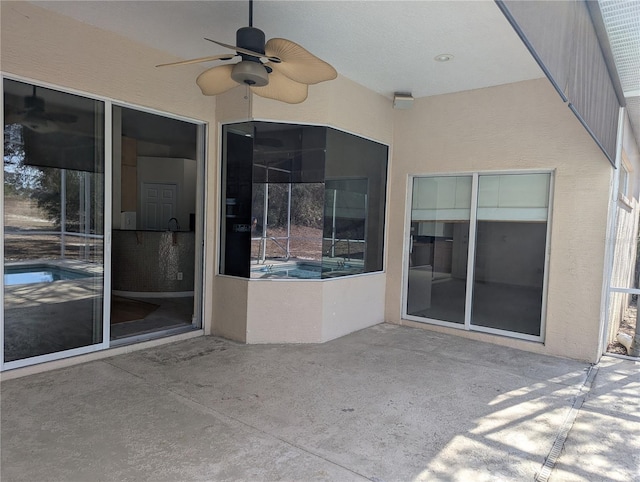 view of patio / terrace with ceiling fan