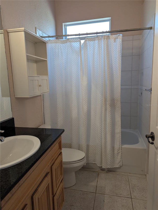 full bathroom featuring shower / tub combo, vanity, tile patterned floors, and toilet