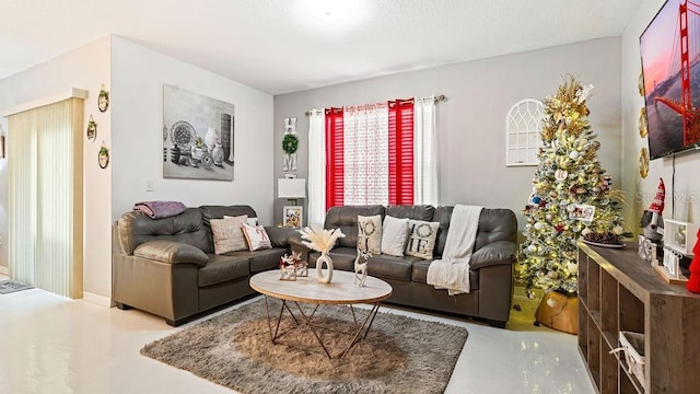 living room featuring concrete floors