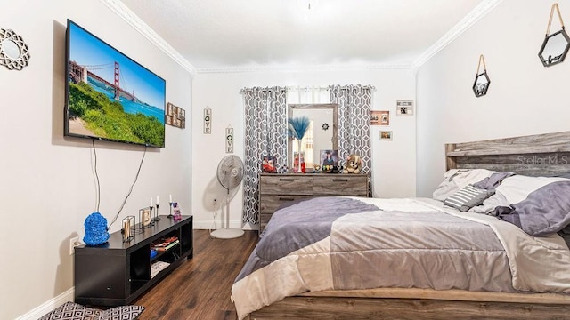 bedroom with crown molding and dark hardwood / wood-style flooring