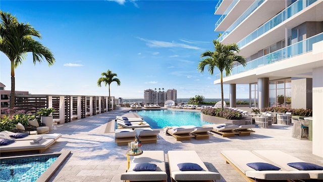 view of swimming pool featuring a patio area