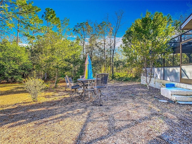 view of patio with a lanai