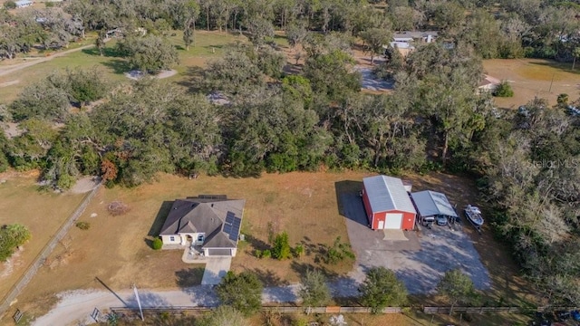 birds eye view of property featuring a rural view