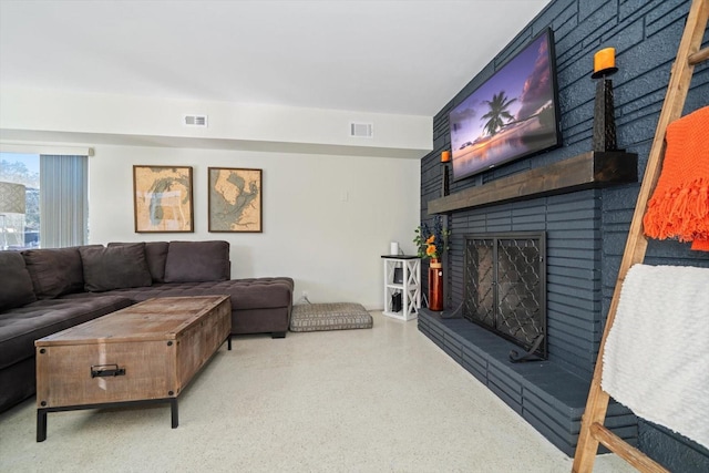 living room with a fireplace