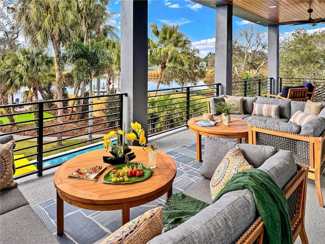 balcony with ceiling fan and an outdoor hangout area