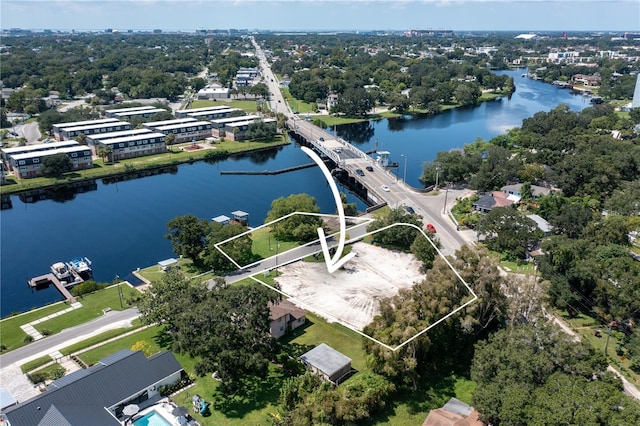 birds eye view of property featuring a water view