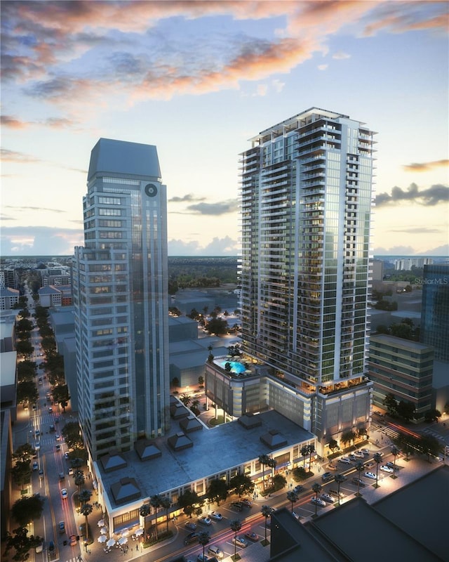 view of outdoor building at dusk