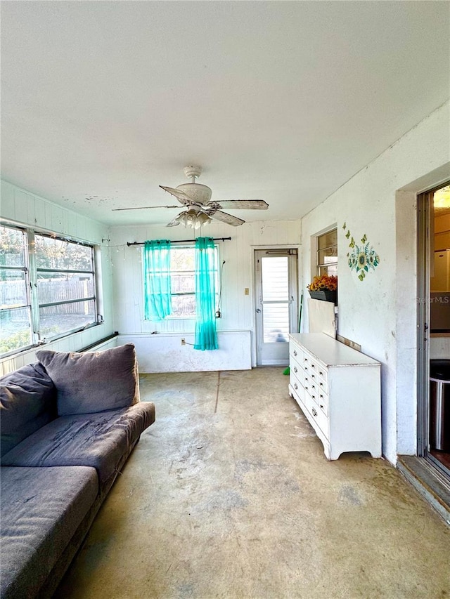 living room featuring ceiling fan