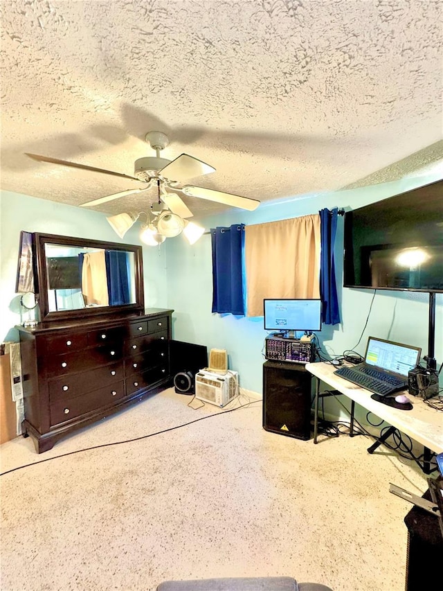 office space featuring a textured ceiling and ceiling fan