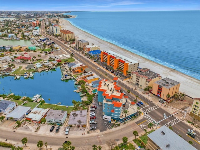 bird's eye view with a beach view and a water view