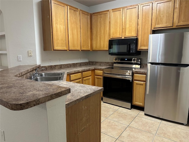 kitchen with kitchen peninsula, stainless steel appliances, light tile patterned floors, and sink