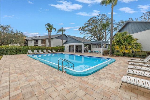 community pool featuring a patio