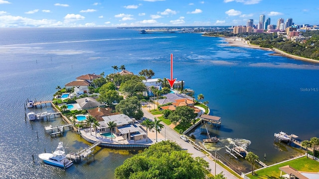 birds eye view of property featuring a water view