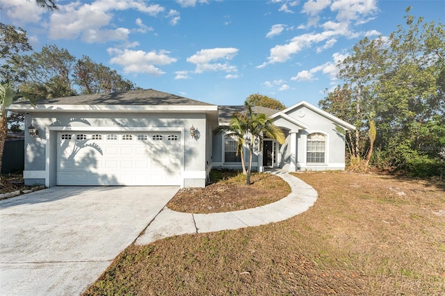 ranch-style house with a front lawn and a garage