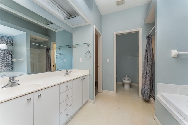 bathroom featuring shower with separate bathtub, a bidet, and vanity