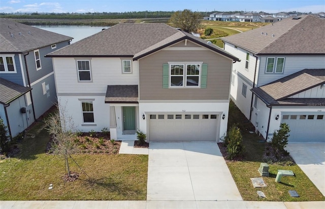 front of property with a garage and a front yard