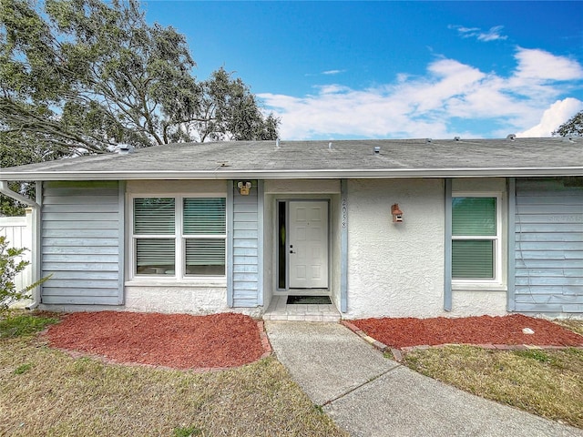 view of front of property with a front lawn