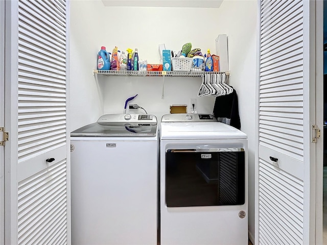 laundry room with separate washer and dryer