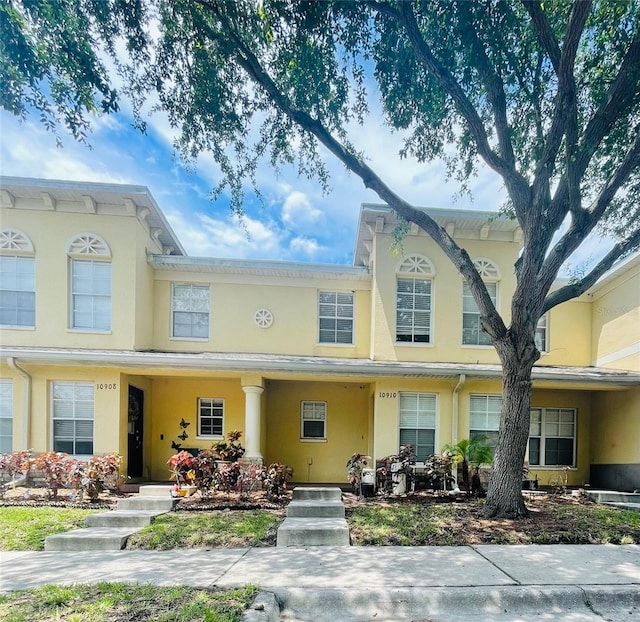 multi unit property featuring a porch