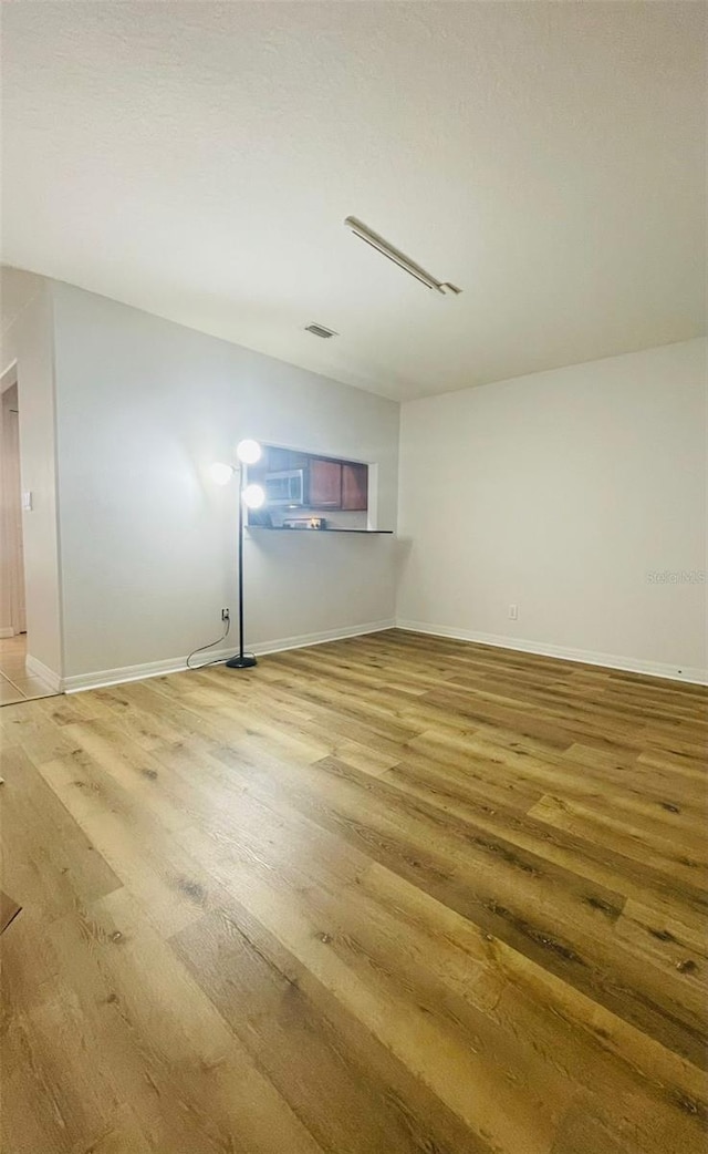 interior space with hardwood / wood-style flooring