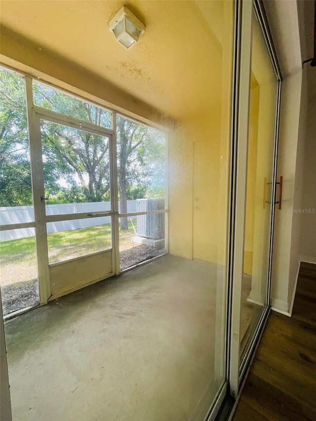 unfurnished sunroom featuring a wealth of natural light