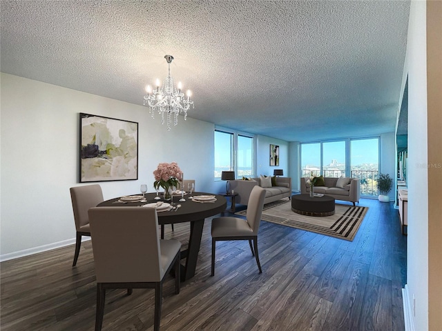 dining area with a wall of windows, a textured ceiling, a chandelier, and dark hardwood / wood-style floors