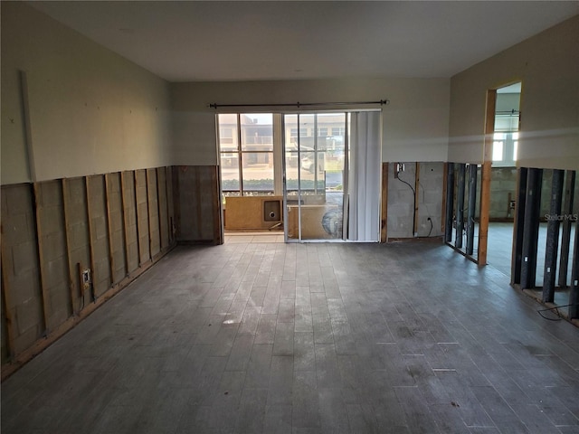 spare room with hardwood / wood-style flooring