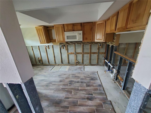 kitchen with a tray ceiling