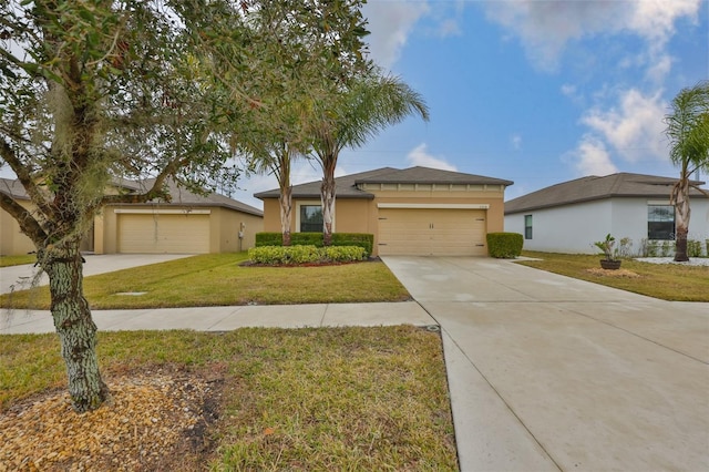 single story home with a front yard and a garage