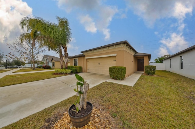 view of front of house with a garage and a front lawn