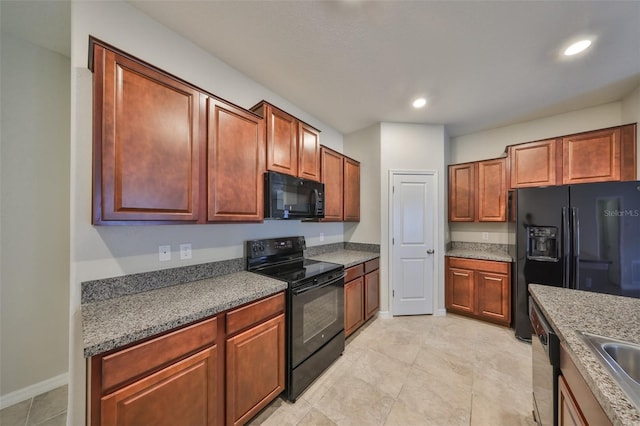 kitchen with black appliances