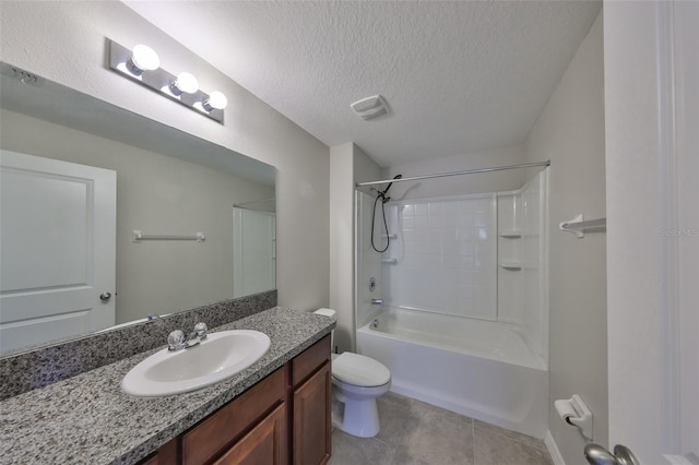 full bathroom featuring tile patterned floors,  shower combination, a textured ceiling, toilet, and vanity