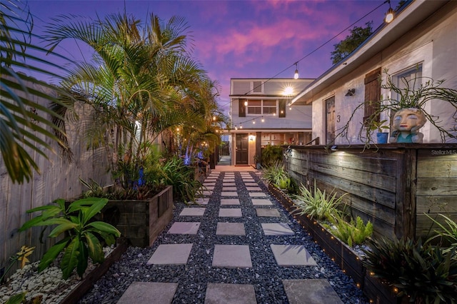 view of patio terrace at dusk