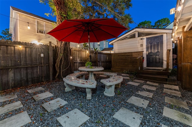 view of patio with an outbuilding