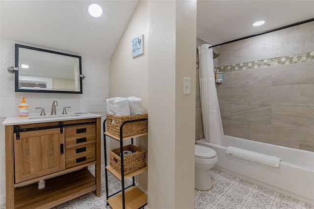 full bathroom with tile patterned floors, toilet, lofted ceiling, vanity, and shower / bathtub combination with curtain