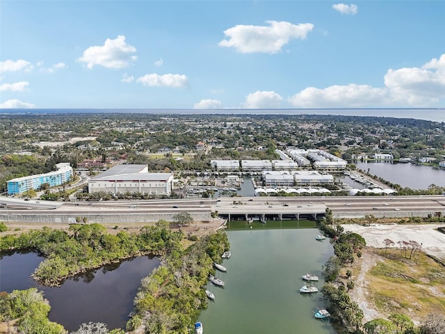 birds eye view of property featuring a water view