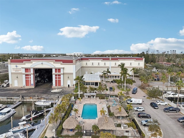 birds eye view of property with a water view