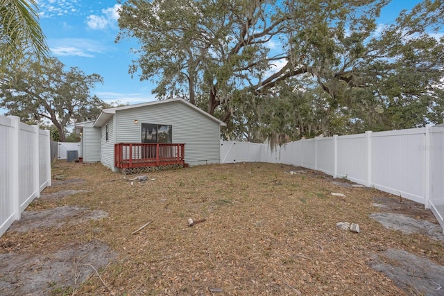 view of yard with a wooden deck