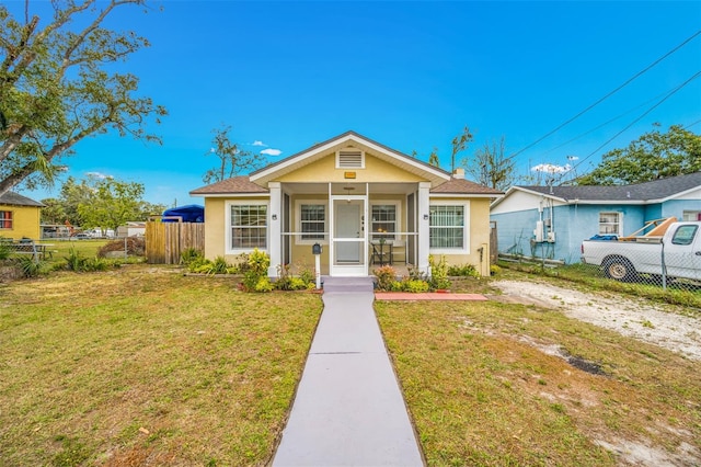 view of front of property with a front lawn