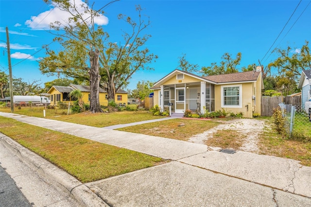 view of front of property with a front lawn