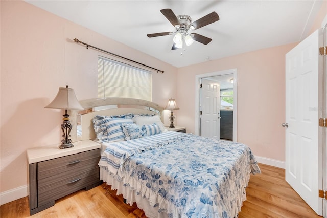 bedroom featuring ceiling fan and light hardwood / wood-style flooring