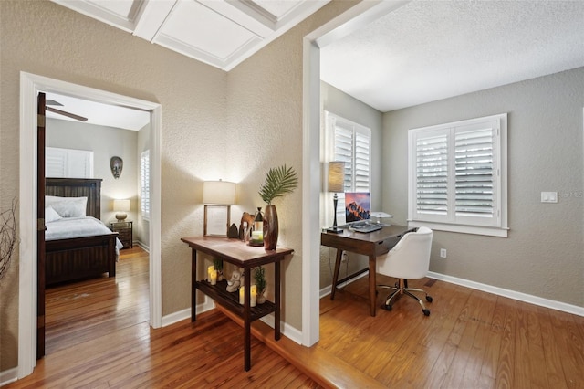 office space with hardwood / wood-style flooring