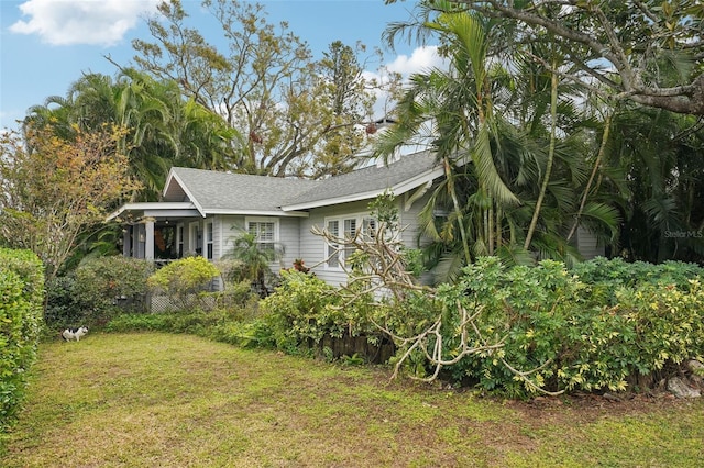 view of property exterior featuring a yard