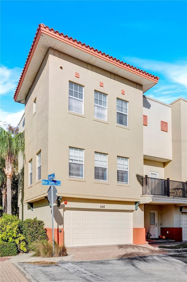 view of building exterior with a garage