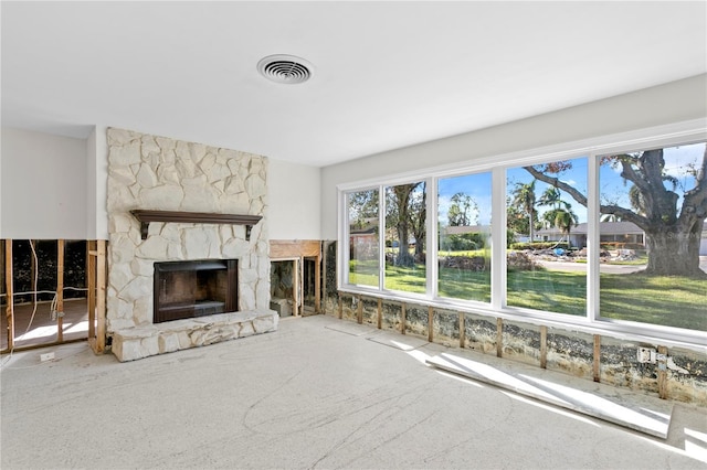 unfurnished living room with a fireplace