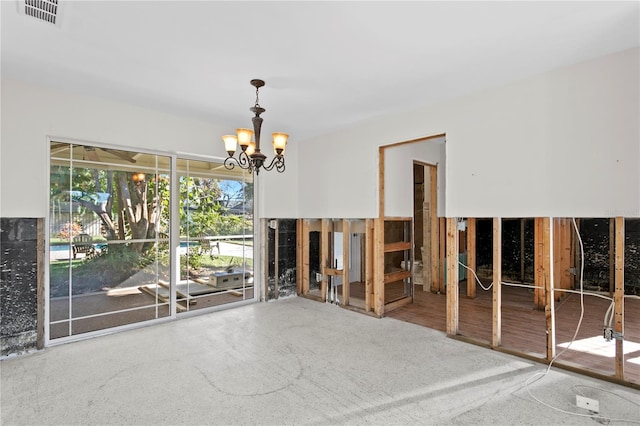 interior space featuring a chandelier