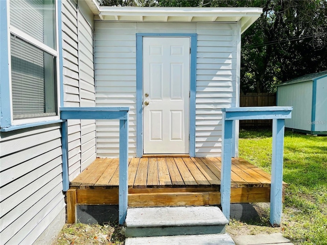 entrance to property with a wooden deck