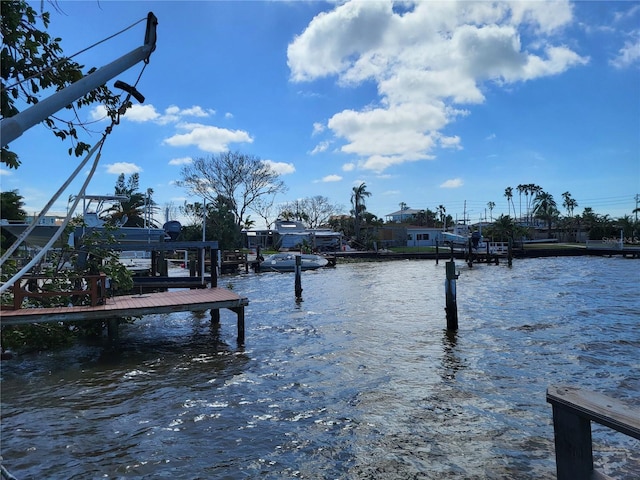 view of dock with a water view